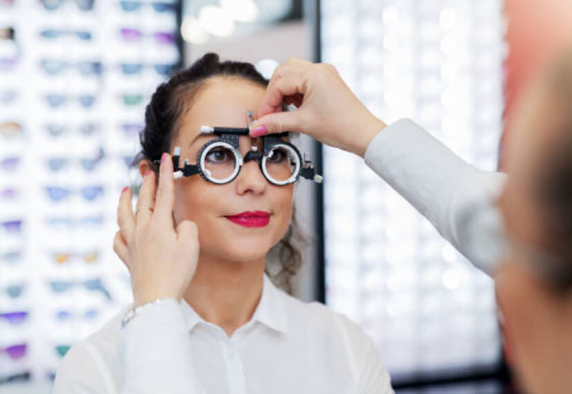 Woman getting her glasses fitted