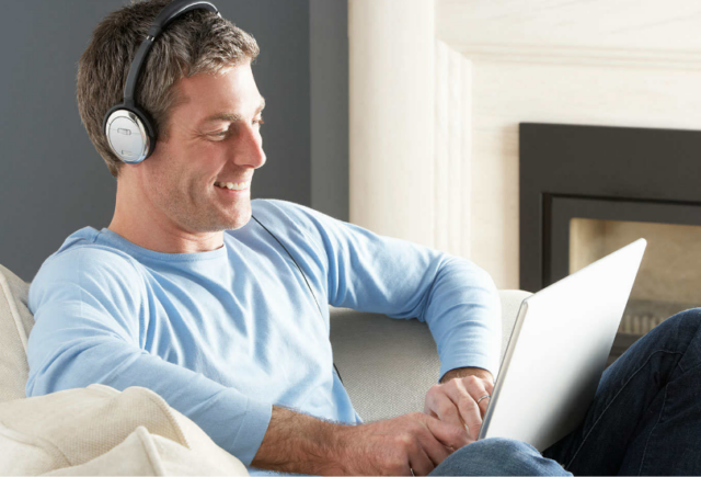 Man doing an online hearing test